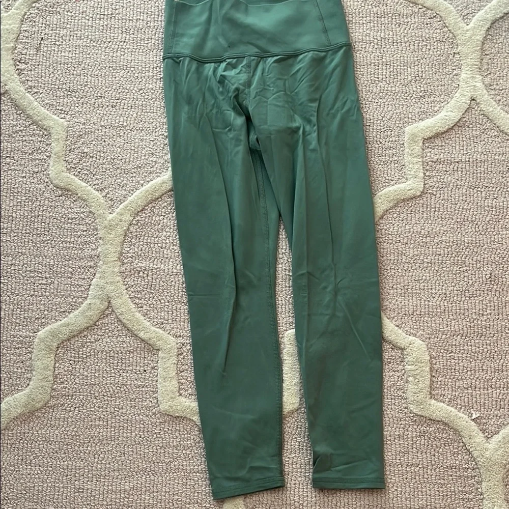 Green leggings